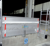 Fastmontert lastebro Definitive, med glideskinne